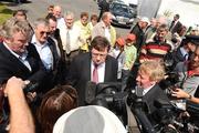 29 July 2009; An Taoiseach Brian Cowen T.D. accompanied by racecourse manager John Moloney, right, meets the press ahead of the third day of the Galway Racing Festival. Ballybrit, Galway. Picture credit: Stephen McCarthy / SPORTSFILE