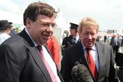 29 July 2009; An Taoiseach Brian Cowen T.D. accompanied by racecourse manager John Moloney, right, meets the press ahead of the third day of the Galway Racing Festival. Ballybrit, Galway. Picture credit: Stephen McCarthy / SPORTSFILE