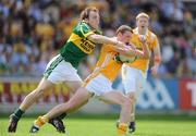 26 July 2009; Aaron Douglas, Antrim, in action against Darran O'Sullivan, Kerry. GAA All-Ireland Senior Football Championship Qualifier Round 4, Antrim v Kerry, O'Connor Park, Tullamore, Co. Offaly. Picture credit: Brendan Moran / SPORTSFILE
