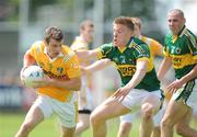 26 July 2009; James Loughrey, Antrim, in action against Tommy Walsh, Kerry. GAA All-Ireland Senior Football Championship Qualifier Round 4, Antrim v Kerry, O'Connor Park, Tullamore, Co. Offaly. Picture credit: Brendan Moran / SPORTSFILE