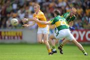 26 July 2009; Paddy Cunningham, Antrim, in action against Killian Young, Kerry. GAA All-Ireland Senior Football Championship Qualifier Round 4, Antrim v Kerry, O'Connor Park, Tullamore, Co. Offaly. Picture credit: Brendan Moran / SPORTSFILE