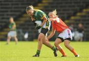 26 July 2009; Graine Nulty, Meath, in action against Maria O'Donnell, Armagh. TG4 All-Ireland Ladies Football Senior Championship Qualifier, Round 1, Armagh v Meath, Kingspan Breffni Park, Cavan. Picture credit: Pat Murphy / SPORTSFILE