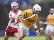 29 July 2009; Aaron Graffin, Antrim, is tackled by Oisin McCloskey, Derry. Bord Gais Energy GAA Ulster U21 Hurling Championship Final, Antrim v Derry, Casement Park, Belfast, Co. Antrim. Picture credit: Oliver McVeigh / SPORTSFILE