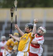 29 July 2009; CJ McGourty, Antrim, in action against Darragh McCloskey, Derry. Bord Gais Energy GAA Ulster U21 Hurling Championship Final, Antrim v Derry, Casement Park, Belfast, Co. Antrim. Picture credit: Oliver McVeigh / SPORTSFILE