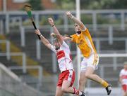 29 July 2009; Thomas McCann, Antrim, in action against Gearoid O'Neill, Derry. Bord Gais Energy GAA Ulster U21 Hurling Championship Final, Antrim v Derry, Casement Park, Belfast, Co. Antrim. Picture credit: Oliver McVeigh / SPORTSFILE
