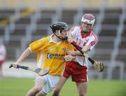 29 July 2009; CJ McGourty, Antrim, in action against Darragh McCloskey, Derry. Bord Gais Energy GAA Ulster U21 Hurling Championship Final, Antrim v Derry, Casement Park, Belfast, Co. Antrim. Picture credit: Oliver McVeigh / SPORTSFILE