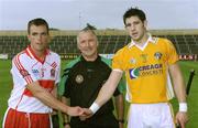29 July 2009; Referee Gerard Devlin, Armagh,  with Derry captain Oisin McCloskey, left, and Antrim captain Cormac Donnelly before the game. Bord Gais Energy GAA Ulster U21 Hurling Championship Final, Antrim v Derry, Casement Park, Belfast, Co. Antrim. Picture credit: Oliver McVeigh / SPORTSFILE