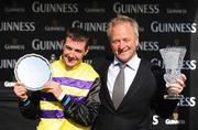 30 July 2009; Jockey Stephen Gray and trainer Patrick Flynn after winning the Arthur Guinness Galway Hurdle Handicap with Bahrain Storm. Galway Racing Festival - Thursday, Ballybrit, Galway. Picture credit: Stephen McCarthy / SPORTSFILE