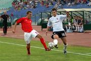 30 July 2009; Thomas Stewart, Derry City, in action against Yordan Minev, CSKA Sofia. Europa League, 3rd Round Qualifier, 1st Leg, CSKA Sofia v Derry City, Vasil Levski National Stadium, Sofia, Bulgaria. Picture credit: Nadia Koceva / SPORTSFILE