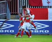 30 July 2009; Declan O'Brien, 23, St. Patrick’s Athletic, celebrates with team-mates Ryan Guy, left, and Jamie Harris after scoring his side's first goal against Krylya Sovetov. Europa League, 3rd Round Qualifier, 1st leg, St. Patrick’s Athletic v Krylya Sovetov, Richmond Park, Dublin. Picture credit: Matt Browne / SPORTSFILE