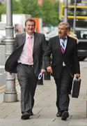 31 July 2009; Cork City owner and chairman Tom Coughlan, left, arrives at court for a judgement in the High Court after a winding up order was granted. High Court, Four Courts, Dublin. Picture credit: Pat Murphy / SPORTSFILE