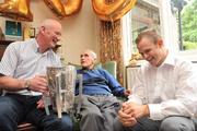 31 July 2009; Martin White, the oldest All-Ireland hurling medal winner still alive, was joined for his 100th birthday celebrations by Kilkenny manager Brian Cody, left, with the Liam MacCarthy cup, and Kilkenny hurler Tommy Walsh at his Dublin home in Glasnevin. Martin won Senior All-Ireland hurling medals with Kilkenny in 1932, 1933 & 1935. Picture credit: David Maher / SPORTSFILE