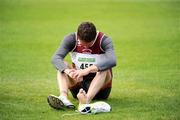 1 August 2009; Martin Fagan, Mullingar Harriers A.C., lies dejected after pulling up during the Men's 10,000m Final. Woodie's DIY / AAI National Senior Track & Field Championships - Saturday. Morton Stadium, Santry, Dublin. Picture credit: Stephen McCarthy / SPORTSFILE