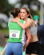 1 August 2009; Linda Byrne, Dundrum South Dublin A.C., right, is congratulated by Rosemary Ryan, Bilboar A.C., after winning the Women's 5000m Final. Woodie's DIY / AAI National Senior Track & Field Championships - Saturday. Morton Stadium, Santry, Dublin. Picture credit: Stephen McCarthy / SPORTSFILE