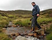 1 August 2009; James McGarry, Kilkenny, makes his way accross a river during the 2009 M Donnelly Poc Fada. Annaverna Mountains, Dundalk, Co. Louth. Picture credit: Pat Murphy / SPORTSFILE