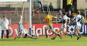 1 August 2009; Cian Ward,15, Meath, scores the first goal of the game past Limerick goalkeeper Sean Kiiely. GAA Football All-Ireland Senior Championship Qualifier, Round 4, Meath v Limerick, O'Moore Park, Portlaoise, Co. Laois. Picture credit: Matt Browne / SPORTSFILE