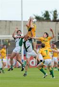 1 August 2009; Nigel Crawford, Meath, takes the high ball ahead of Jason Stokes, Limerick. GAA Football All-Ireland Senior Championship Qualifier, Round 4, Meath v Limerick, O'Moore Park, Portlaoise, Co. Laois. Picture credit: Matt Browne / SPORTSFILE