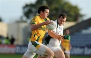 1 August 2009; Brian Meade, Meath, in action against Jason Stokes, Limerick. GAA Football All-Ireland Senior Championship Qualifier, Round 4, Meath v Limerick, O'Moore Park, Portlaoise, Co. Laois. Picture credit: Matt Browne / SPORTSFILE