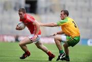 2 August 2009; Colm O'Neill, Cork, in action against Neil McGee, Donegal. GAA Football All-Ireland Senior Championship Quarter-Final, Cork v Donegal, Croke Park, Dublin. Picture credit: Oliver McVeigh / SPORTSFILE