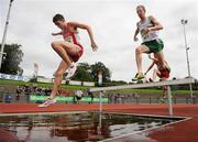 2 August 2009; Rory Chesser, Ennis Track AC, clears the water jump on his way to winning the Men's 3000m Steeplechase ahead of Mark Kirwan, Raheny Shamrock AC, right, at the Woodie's DIY / AAI National Senior Track & Field Championships. Morton Stadium, Santry, Dublin. Picture credit: Pat Murphy / SPORTSFILE