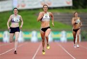 2 August 2009; Marian Andrews, Togher AC, leads eventual second Claire Bergin, 120, Dundrum South Dublin AC, on her way to winning the Women's 400m Final. Woodie's DIY / AAI National Senior Track & Field Championships. Morton Stadium, Santry, Dublin. Picture credit: Brendan Moran / SPORTSFILE