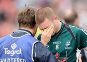 2 August 2009; A dejected Daryl Flynn, Kildare, is consoled after his side's defeat. GAA Football All-Ireland Senior Championship Quarter-Final, Tyrone v Kildare, Croke Park, Dublin. Picture credit: Stephen McCarthy / SPORTSFILE