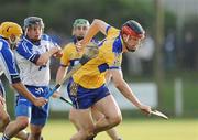 29 July 2009; Darach Honan, Clare, in action against Shane Fives, Waterford. Bord Gais Energy GAA Munster U21 Hurling Championship Final, Waterford v Clare, Fraher Field, Dungarvan, Co Waterford. Picture credit: Matt Browne / SPORTSFILE