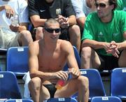 31 July 2009; Ireland's Barry Murphy, from Drumcondra, Dublin, left, and team-mate Andrew Bree, from Helen's Bay, Co. Down, relax at the competiton pool. Earlier in the day Murphy won his heat of the Men's 50m Freestyle in a time of 22.14 setting a new Irish Senior Record and finishing 19th overall. FINA World Swimming Championships Rome 2009, Foro Italico, Rome, Italy. Picture credit: Brian Lawless / SPORTSFILE