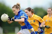31 July 2009; Samantha Lambert, Tipperary, in action against Lisa Walsh, Roscommon. All-Ireland Minor B Championship Final, Tipperary v Roscommon, Ferbane GAA Club, Ferbane, Co. Offaly. Picture credit: Matt Browne / SPORTSFILE
