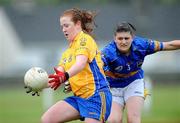 31 July 2009; Niamh McHugh, Roscommon, in action against Aoife Casey, Tipperary. All-Ireland Minor B Championship Final, Tipperary v Roscommon, Ferbane GAA Club, Ferbane, Co. Offaly. Picture credit: Matt Browne / SPORTSFILE