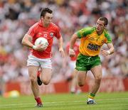 2 August 2009; Paul Kerrigan, Cork, in action against Barry Dunnion, Donegal. GAA Football All-Ireland Senior Championship Quarter-Final, Cork v Donegal, Croke Park, Dublin. Picture credit: Ray McManus / SPORTSFILE