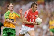2 August 2009; Fiachra Lynch, Cork, in action against Eoin Wade, Donegal. GAA Football All-Ireland Senior Championship Quarter-Final, Cork v Donegal, Croke Park, Dublin. Picture credit: Ray McManus / SPORTSFILE