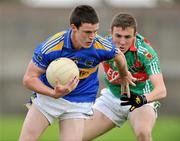 3 August 2009; Ross McGrath, Tipperary, in action against Darren Coen, Mayo. ESB GAA Football All-Ireland Minor Championship Quarter-Final, Mayo v Tipperary, O'Connor Park, Tullamore, Co. Offaly. Picture credit: David Maher / SPORTSFILE