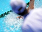 27 July 2009; A general view of a swimmer in action as an official keeps a close watch. FINA World Swimming Championships Rome 2009, Foro Italico, Rome, Italy. Picture credit: Brian Lawless / SPORTSFILE