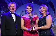 14 November 2015; Marie Ambrose, centre, Cork, is presented with her All Star award by Marie Hickey, President, LGFA, in the company of Pól O Gallchóir, Ceannsaí, TG4. 2015 LGFA TG4 Ladies Football Allstar Awards, CityWest Hotel, Saggart, Co. Dublin. Picture credit: Brendan Moran / SPORTSFILE