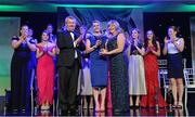 14 November 2015; Briege Corkery, Cork, gets a standing ovation as she is presented with her Senior Players' Player of the Year award by Marie Hickey, President, LGFA. 2015 LGFA TG4 Ladies Football Allstar Awards, CityWest Hotel, Saggart, Co. Dublin. Picture credit: Brendan Moran / SPORTSFILE