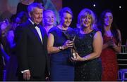14 November 2015; Briege Corkery, Cork, is presented with her Senior Players' Player of the Year award by Marie Hickey, President, LGFA, in the company of Pól O Gallchóir, Ceannsaí, TG4. 2015 LGFA TG4 Ladies Football Allstar Awards, CityWest Hotel, Saggart, Co. Dublin. Picture credit: Ray McManus / SPORTSFILE