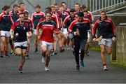 15 November 2015; Cuala players led by, from left, Niall Carthy, Cian Waldron, Sean Brennan and Bobby Brown, warm up behind the goal ahead of the AIB Leinster GAA Senior Club Hurling Championship Semi-Final match between Cuala and Clara at Parnell Park in Dublin. Photo by Ray McManus/Sportsfile