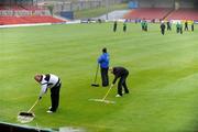 31 July 2009; Groundstaff clear water from the pitch before the game. League of Ireland Premier Division, Cork City v Bray Wanderers, Turners Cross, Cork. Picture credit: Brendan Moran / SPORTSFILE