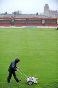 31 July 2009; Groundsman Stephen Cahill lines the pitch before the game. League of Ireland Premier Division, Cork City v Bray Wanderers, Turners Cross, Cork. Picture credit: Brendan Moran / SPORTSFILE