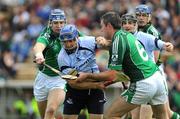 26 July 2009; David Treacy, Dublin, in action against Gavin O'Mahony, left, and Brian Geary, Limerick. GAA All-Ireland Senior Hurling Championship Quarter-Final, Dublin v Limerick, Semple Stadium, Thurles, Co. Tipperary. Picture credit: Ray McManus / SPORTSFILE
