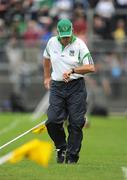 26 July 2009; Limerick manager Justin McCarthy checks his watch during the final minutes of the game. GAA All-Ireland Senior Hurling Championship Quarter-Final, Dublin v Limerick, Semple Stadium, Thurles, Co. Tipperary. Picture credit: Ray McManus / SPORTSFILE