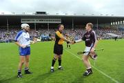 26 July 2009; Galway captain Ollie Canning shakes hands with referee Diarmuid Kierwan, Cork, as Waterford captain Stephen Molumphy awaits the coin toss. GAA All-Ireland Senior Hurling Championship Quarter-Final, Galway v Waterford, Semple Stadium, Thurles, Co. Tipperary. Picture credit: Ray McManus / SPORTSFILE