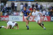 25 July 2009; James Stafford, Wicklow, in action against Daryl Flynn, left, and Robert Kelly, Kildare. GAA All-Ireland Senior Football Championship Qualifier, Round 4, Kildare v Wicklow, O'Moore Park, Portlaoise, Co. Laois. Picture credit: Matt Browne / SPORTSFILE