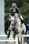 6 August 2009; Mullaghdrin Gold Rain, with Shane Breen up, Ireland, jumps the ninth fence on their way to winning the International Speed Derby. Fáilte Ireland Dublin Horse Show 2009, RDS, Ballsbridge, Dublin. Picture credit: Matt Browne / SPORTSFILE