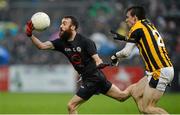 15 November 2015; Conor Laverty, Kilcoo, in action against Paul Hughes, Crossmaglen Rangers. AIB Ulster GAA Senior Club Football Championship, Semi-Final, Kilcoo v Crossmaglen Rangers. Páirc Esler, Newry, Co. Down. Picture credit: Oliver McVeigh / SPORTSFILE
