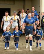 15 November 2015; Leinster matchday mascots Holly and Jenna Colgan, from Foxrock, Dublin and Conal O'Driscoll, from Sandyford, Dublin, walk out with team-mcaptain Jamie Heaslip before the European Rugby Champions Cup, Pool 5, Round 1, clash between Leinster and Wasps at the RDS, Ballsbridge, Dublin. Picture credit: Brendan Moran / SPORTSFILE