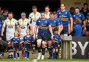 15 November 2015; Leinster matchday mascots Holly and Jenna Colgan, from Foxrock, Dublin, and Conal O'Driscoll, from Sandyford, Dublin, walk out with team-captain Jamie Heaslip before the European Rugby at the European Rugby Champions Cup, Pool 5, Round 1, clash between Leinster and Wasps at the RDS, Ballsbridge, Dublin. Picture credit: Stephen McCarthy / SPORTSFILE
