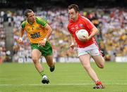2 August 2009; Paul Kerrigan, Cork, in action against Barry Dunnion, Donegal. GAA Football All-Ireland Senior Championship Quarter-Final, Cork v Donegal, Croke Park, Dublin. Picture credit: Stephen McCarthy / SPORTSFILE