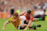 9 August 2009; Brian Farrell, Meath, and Keith Higgins, Mayo, tussle off the ball. GAA Football All-Ireland Senior Championship Quarter-Final, Meath v Mayo, Croke Park, Dublin. Picture credit: Stephen McCarthy / SPORTSFILE